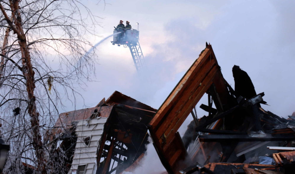 Firefighters work on an apartment fire in Edgewater, NJ.