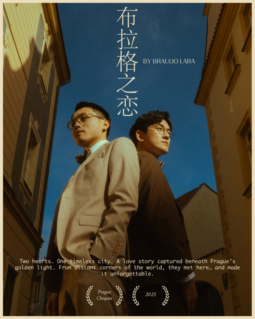 Two men stand back to back between narrow historic buildings in Prague, dressed in elegant suits and looking in opposite directions. Warm evening light illuminates the scene, creating a cinematic atmosphere.

The image appears as a film-style poster by photographer Braulio Lara, telling a love story set within the timeless streets of Prague.
