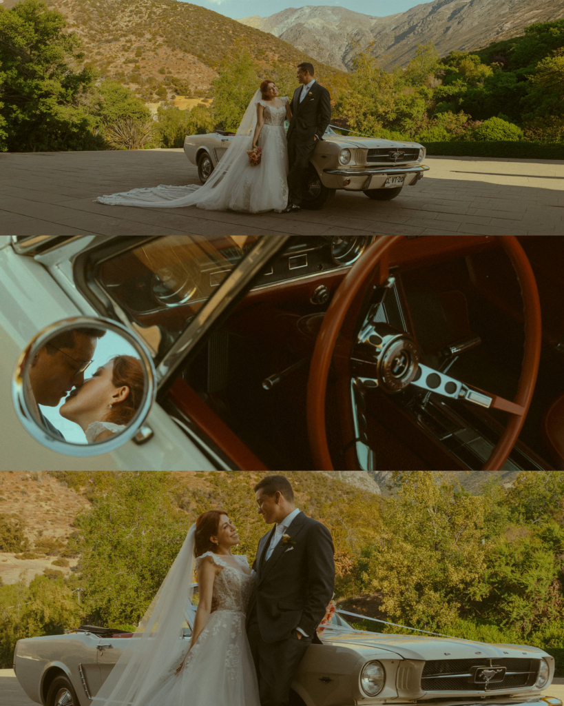 A bride and groom stand beside a vintage Ford Mustang in a sunlit mountain landscape. The bride’s long veil flows across the ground as they smile at each other, surrounded by warm afternoon light and green hills.

In a cinematic detail, their kiss appears reflected in the car’s side mirror, framed by the interior of the classic vehicle. The scene blends romance, landscape, and vintage aesthetics.