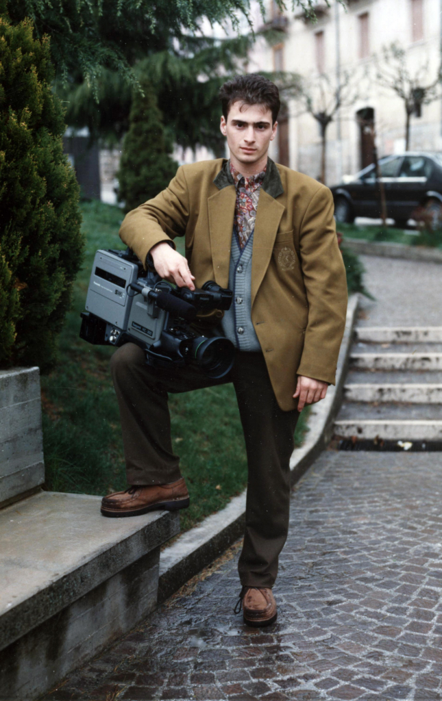 David Melfi as a teenager, learning videography with a professional camera, influenced by his father.